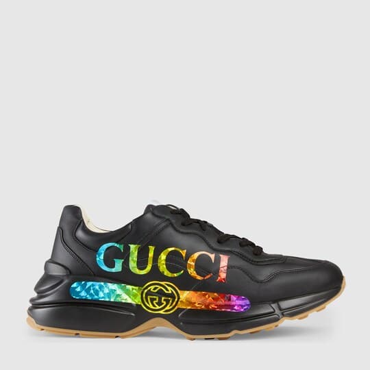 Rhyton leather sneaker with Gucci logo — black leather — 552851DRW001000