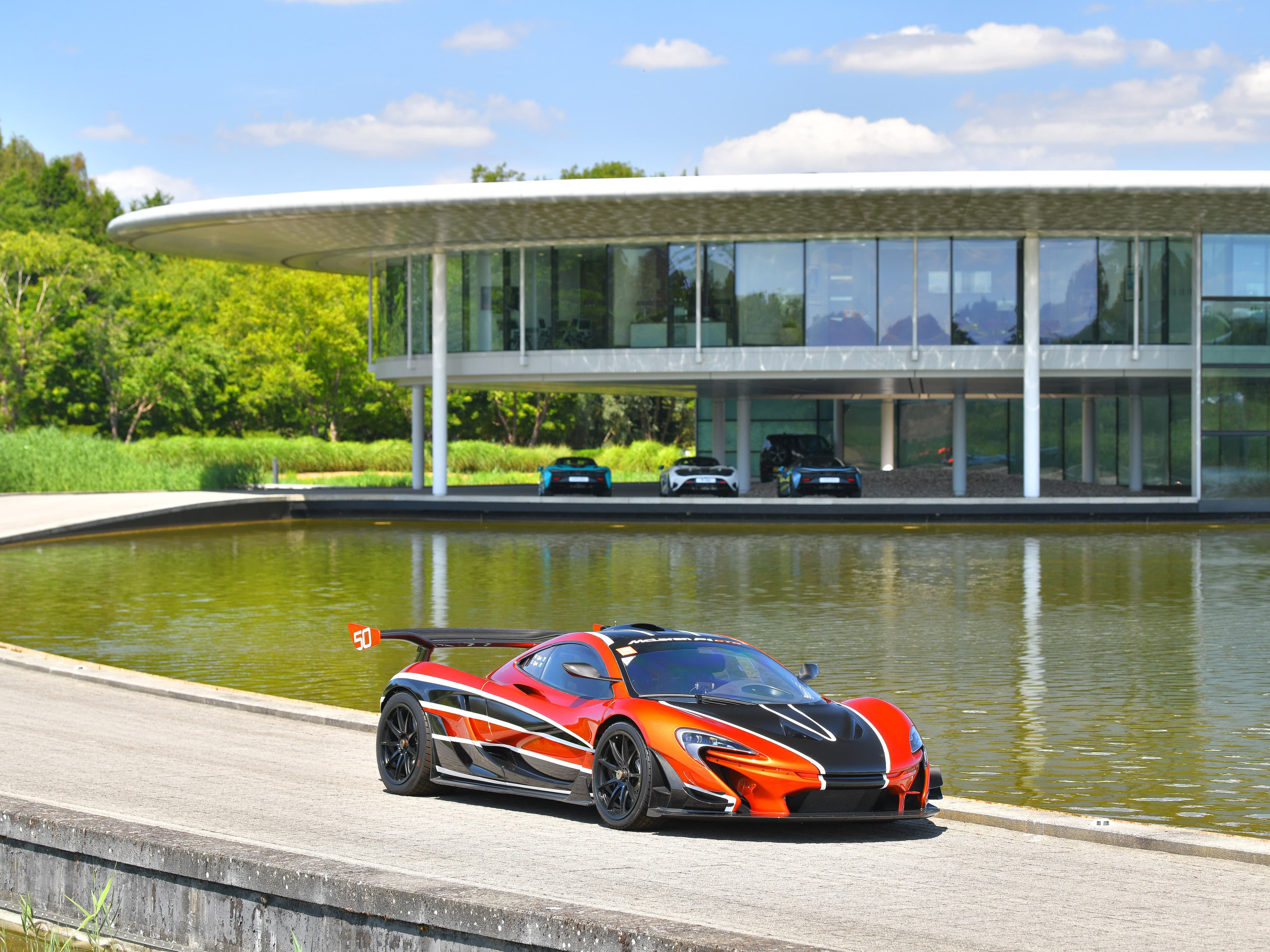 2016 P1 GTR — Mansour Orange with Carbon Black Metallic & Supernova Silver Stripes