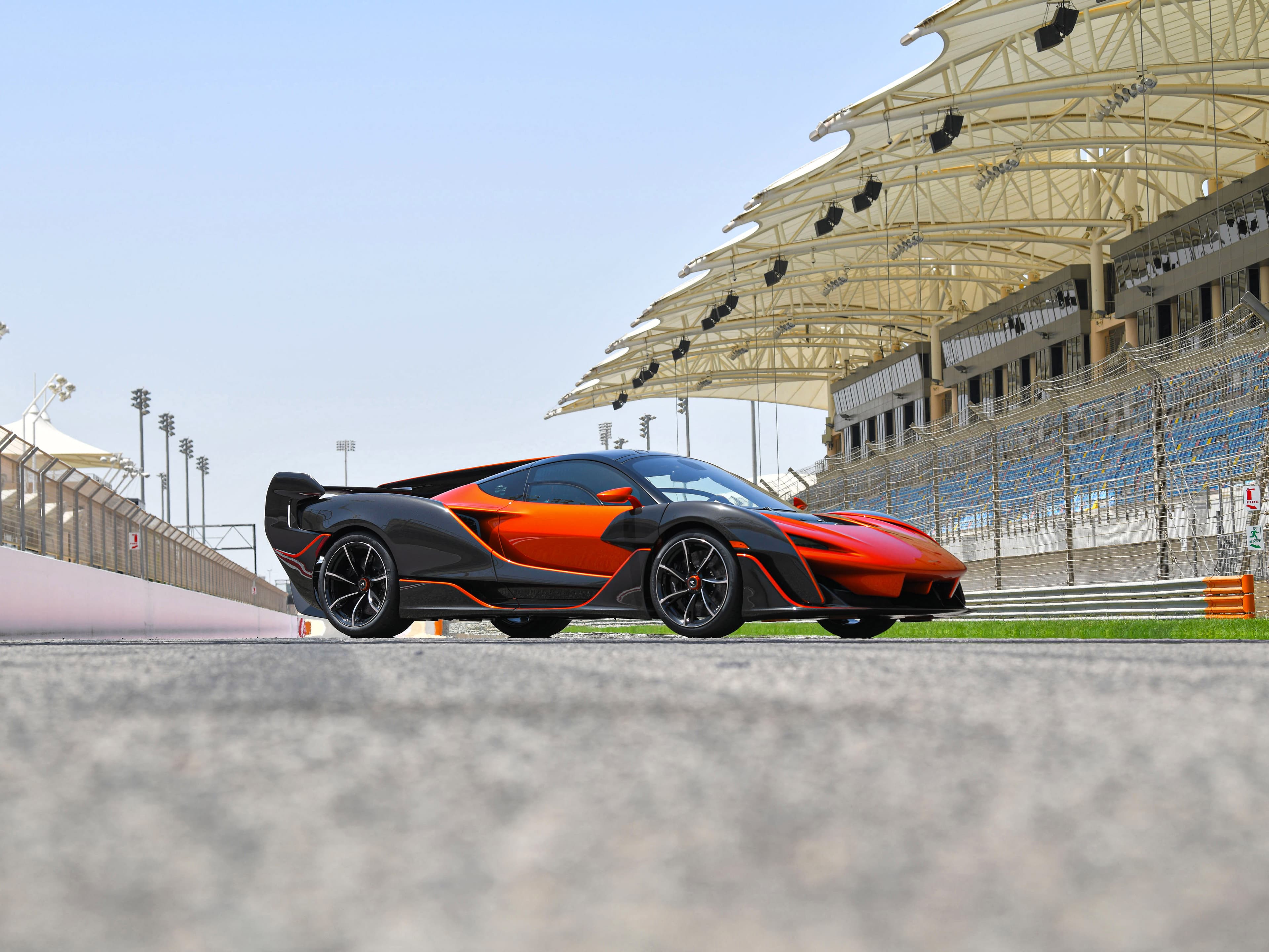 2021 Sabre — Mansour Orange with Exposed Carbon