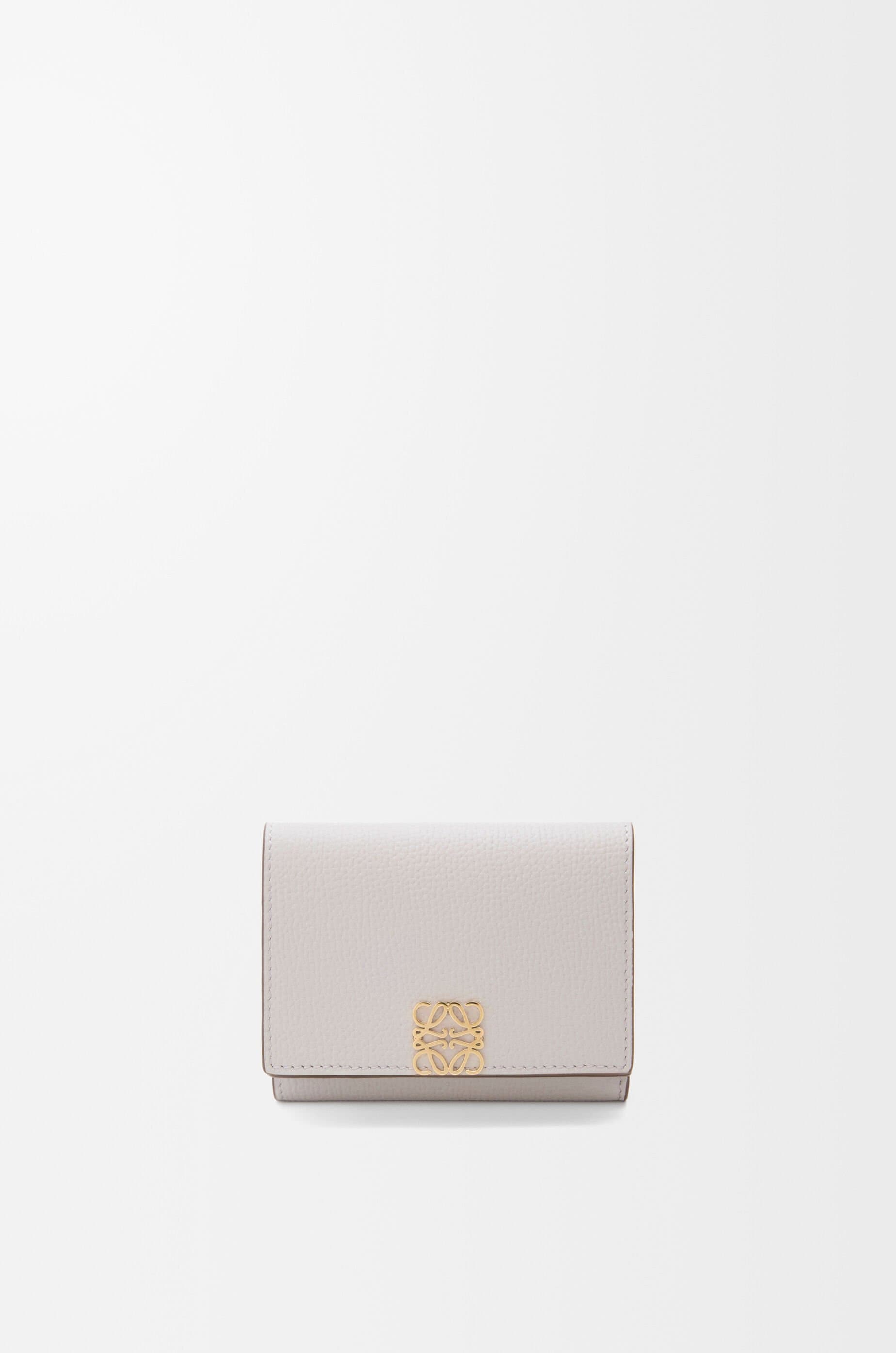 Anagram trifold wallet in pebble grained calfskin — C821TR2X16-8389