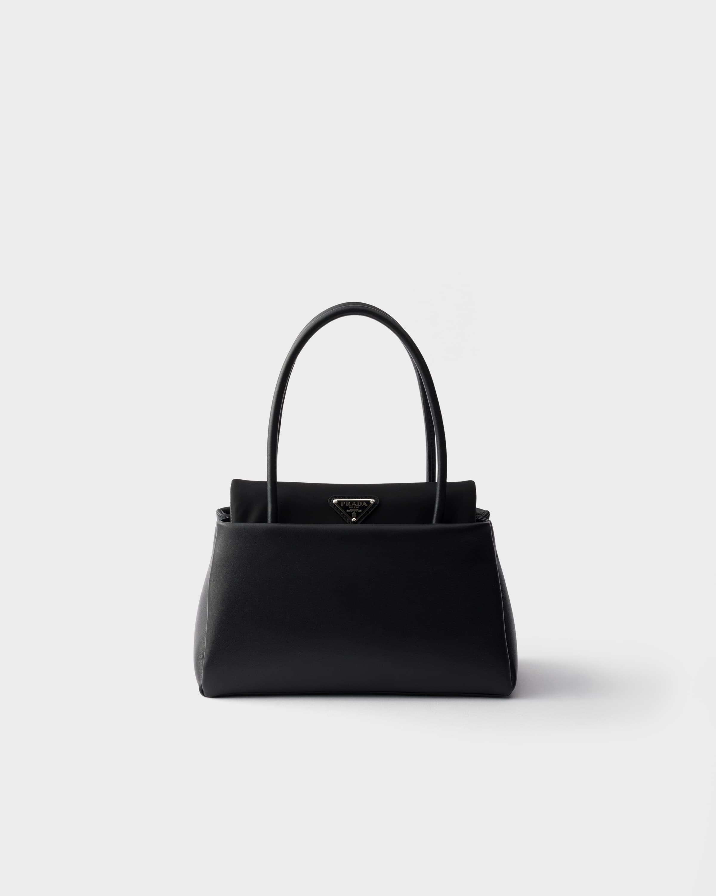 Passage small leather bag with Re-Nylon flap — Black — 1BA501_2G52_F0002_V_OPO