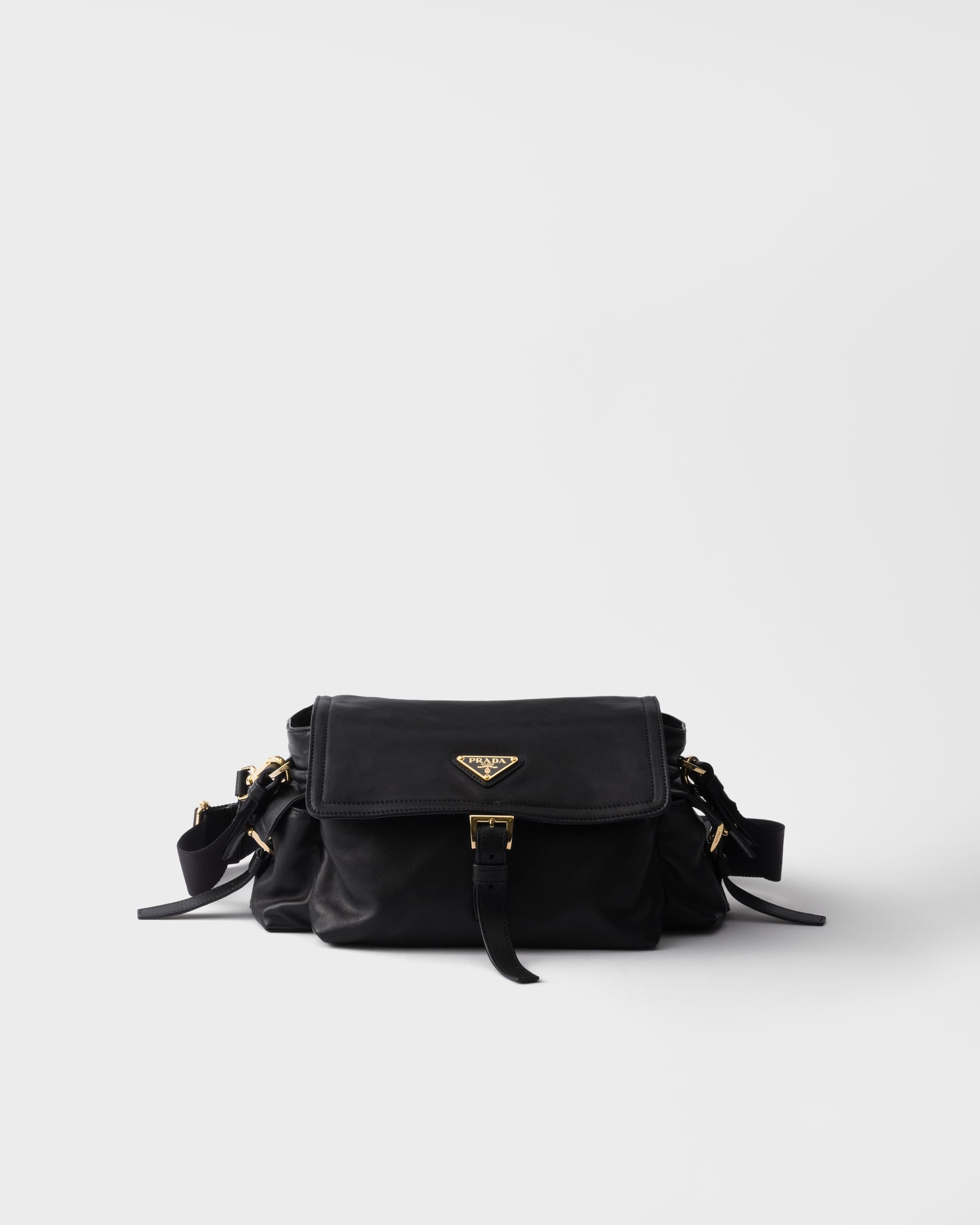 Explore medium nappa leather shoulder bag with flap — Black — 1BD394_2DX8_F0002_V_NOO