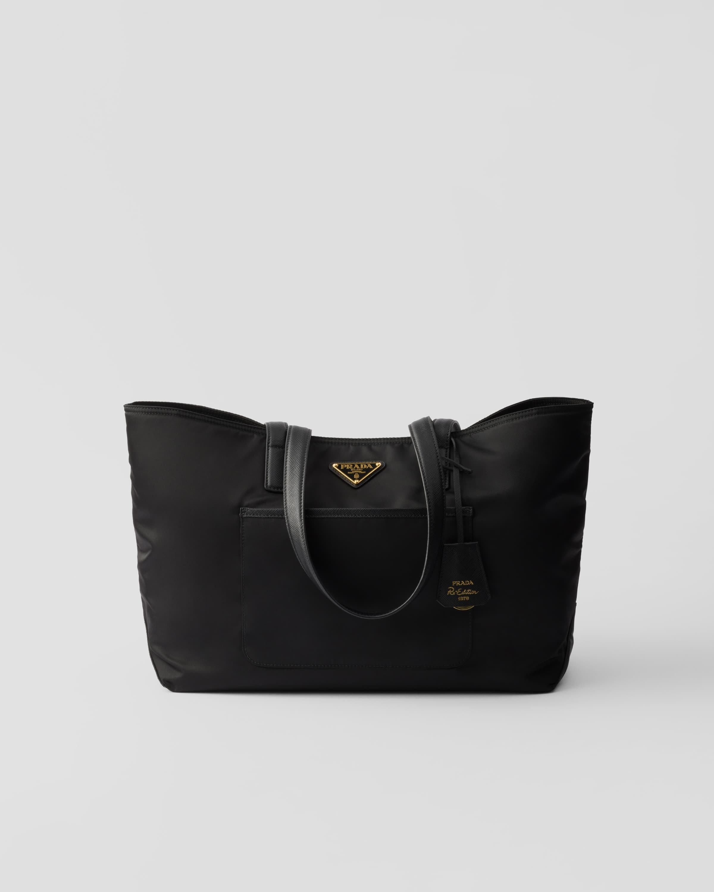 Re-Edition 1978 medium Re-Nylon and Saffiano leather tote bag — Black — 1BG555_R064_F0002_V_OOO