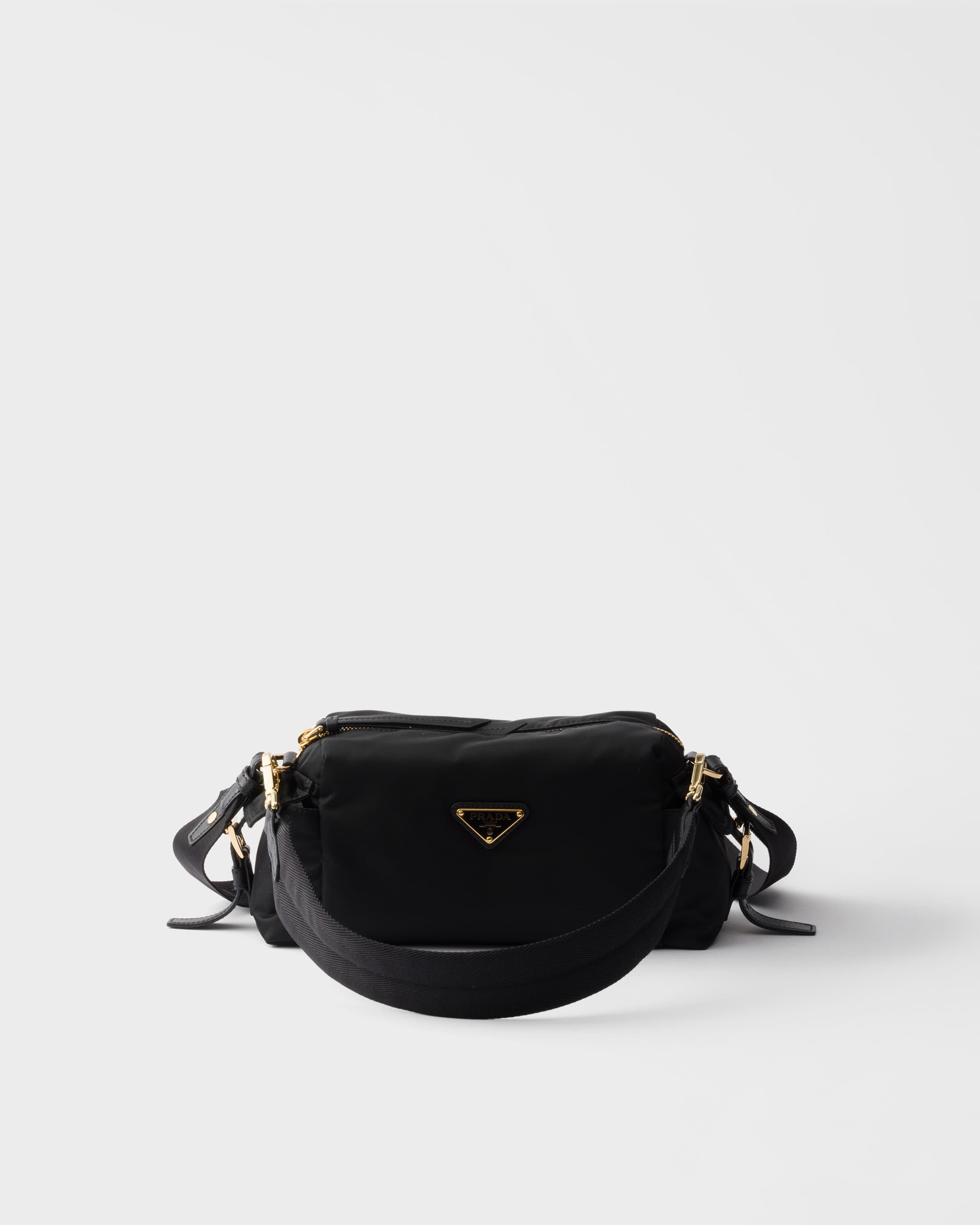Explore small Re-Nylon and leather shoulder bag — Black — 1BH232_RDLN_F0002_V_NOO